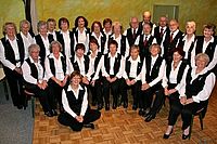 Gruppenfoto der Damen und Herren, knapp 30 Personen, des Gemischten Chores Roland Wedel von 1987